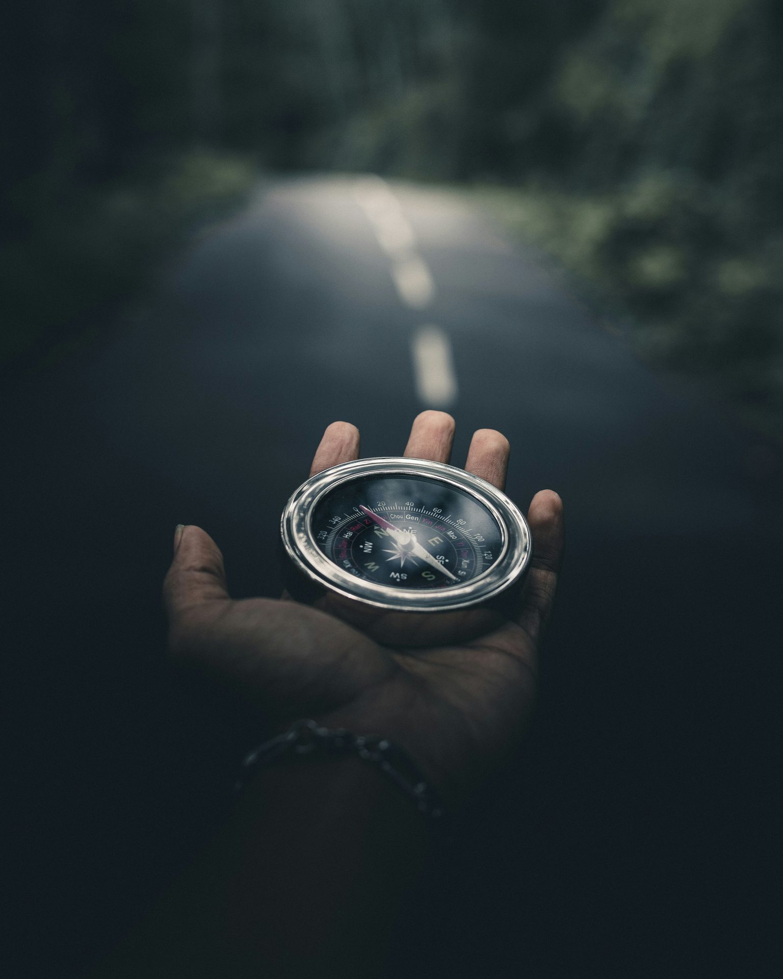 A compass held in an open hand